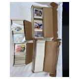 4 PARTIAL BOXES OF ASSORTED SPORTS TRADING CARDS