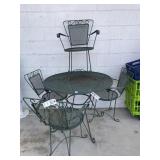 WROUGHT IRON PATIO TABLE AND 4 CHAIRS