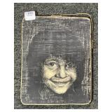 CERAMIC PORTRAIT OF A CHILD BY N.S. 1968 -