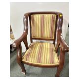 EMPIRE STYLE ARMCHAIR ON CASTORS.