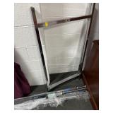 CHROME RETAIL CLOTHING RACK - NEEDS TO BE.