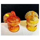 2 COLORED GLASS TURKEYS ON NEST CANDY DISHES.