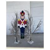 4 LIGHTED TREES AND WOODEN TOY SOLDIER