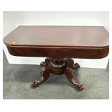 LIONS PAW FOOTED MAHOGANY GAME TABLE.