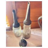 ANTIQUE GLASS OIL BOTTLES - MARQUETTE MFG. CO.
