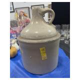 WHITE POTTERY WISKEY JUG
