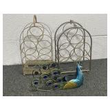 2 METAL WINE HOLDERS AND A PEACOCK METAL WINE