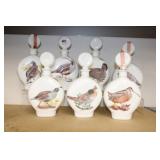 SET OF (7) FILED BIRDS MILK GLASS DECANTERS SET OF (7) FILED BIRDS MILK GLASS DECANTERS