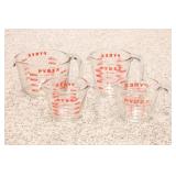 (4) PYREX MEASURE CUPS (4) PYREX MEASURE CUPS