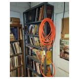 METAL SHELF WITH REPAIR MANUALS AND AIR HOSE