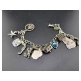 6" STERLING SILVER CHARM BRACELET W/12 CHARMS -