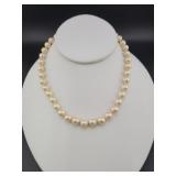 15 INCH STRAND OF PEARLS