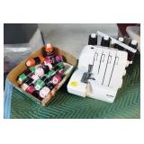 KENMORE MODEL: 385 SERGER W/11 NEW SPOOLS KENMORE MODEL: 385 SERGER W/11 NEW SPOOLS