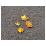3.56 CT CLINOHUMITE - MIXED SHAPES - 4 PCS 3.56 CT CLINOHUMITE - MIXED SHAPES - 4 PCS