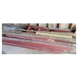 CONTENTS OF ROOM: SCRAP LUMBER, SAW HORSES,