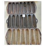 3 CORN STICK PANS - 2 ARE CAST IRON - 1 IS CAST 3 CORN STICK PANS - 2 ARE CAST IRON - 1 IS CAST
