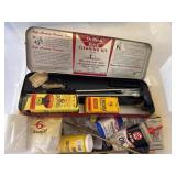 ASSORTED GUN CLEANING ITEMS IN TOTE