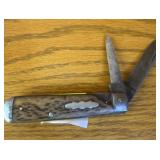 2 Blade Knife with some damage