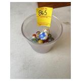 GLASS WITH ASSORTED MARBLES