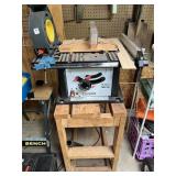 10 IN TABLE SAW ON WOODEN STAND