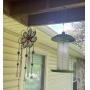 Bird Feeders & Decor On Front Porch