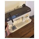 SEWING MACHING & ASSORTED SEWING ITEMS
