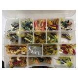 BOX OF PLASTIC JIGS