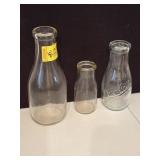 3 MILK BOTTLES (1 IS MARKED "QUALITY")