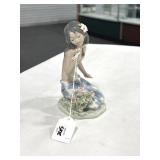 LLADRO IN A TROPICAL GARDEN PORCELAIN FIGURE