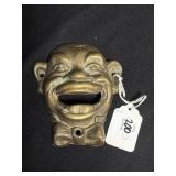 BRASS WALL MOUNT "BLACK AMERICANA SMILEY" BOTTLE