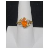 10K YELLOW GOLD AND ORANGE STONE RING -