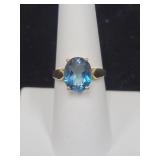 10K YELLOW GOLD AND BLUE STONE RING -