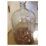 GLASS WATER JUG FILLED WITH PENNIES 1/4 FULL