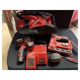 MILWAUKEE 5PC FLASHLIGHT, STAPLE GUN, 25ft TAPE M