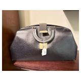 REMONOGRAMMED LEATHER BLACK BAG FULL OF