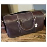(2) LEATHER DUFFLE BAGS W/ NOTEBOOKS &.....
