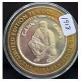 THE MIRAGE/DANNY GANS BI-METALIC $10 GAMING TOKEN-