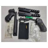 BOX OF ASSORT GUN PARTS, SHELL HOLDERS ETC