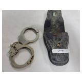 PAIR SMITH & WESSON HANDCUFFS W/KEY AND LEATHER