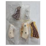 (4) SMITH & WESSON REVOLVER GRIPS AND 1 OTHER