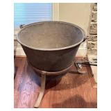 ANTIQUE COPPER KETTLE ON A WROUGHT IRON STAND