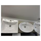 3 . Porcelain sinks.