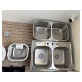 5 Sinks 4 stainless steel  1 Portland