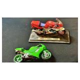 Two die-cast toy motorcycles