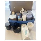 Collection of air fresheners, candles lightbulbs
