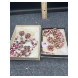 2 BOXES 'PINKISH' COLORED NECKLACE & EARRING SETS
