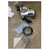 SMALL PORTABLE AIR COMPRESSOR