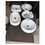 Five porcelain sinks and metal stand only located