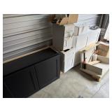 White and black cabinets, iron table located