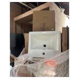 2 pallets containing porcelain sinks in boxes